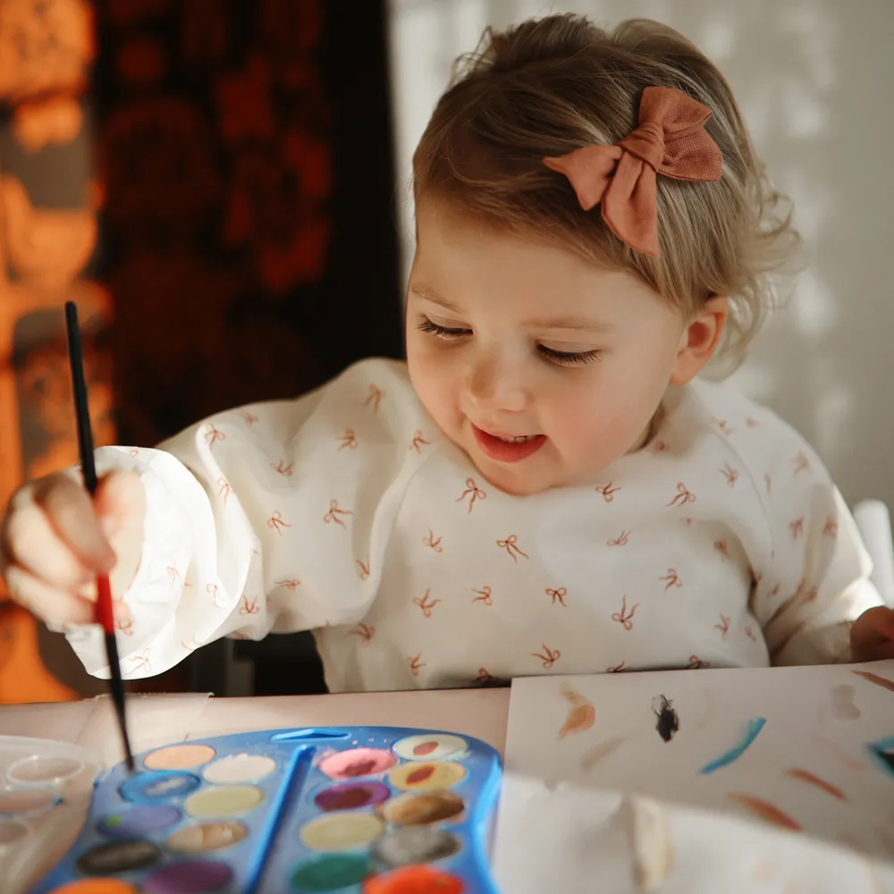 Mushie langærmet hagesmæk