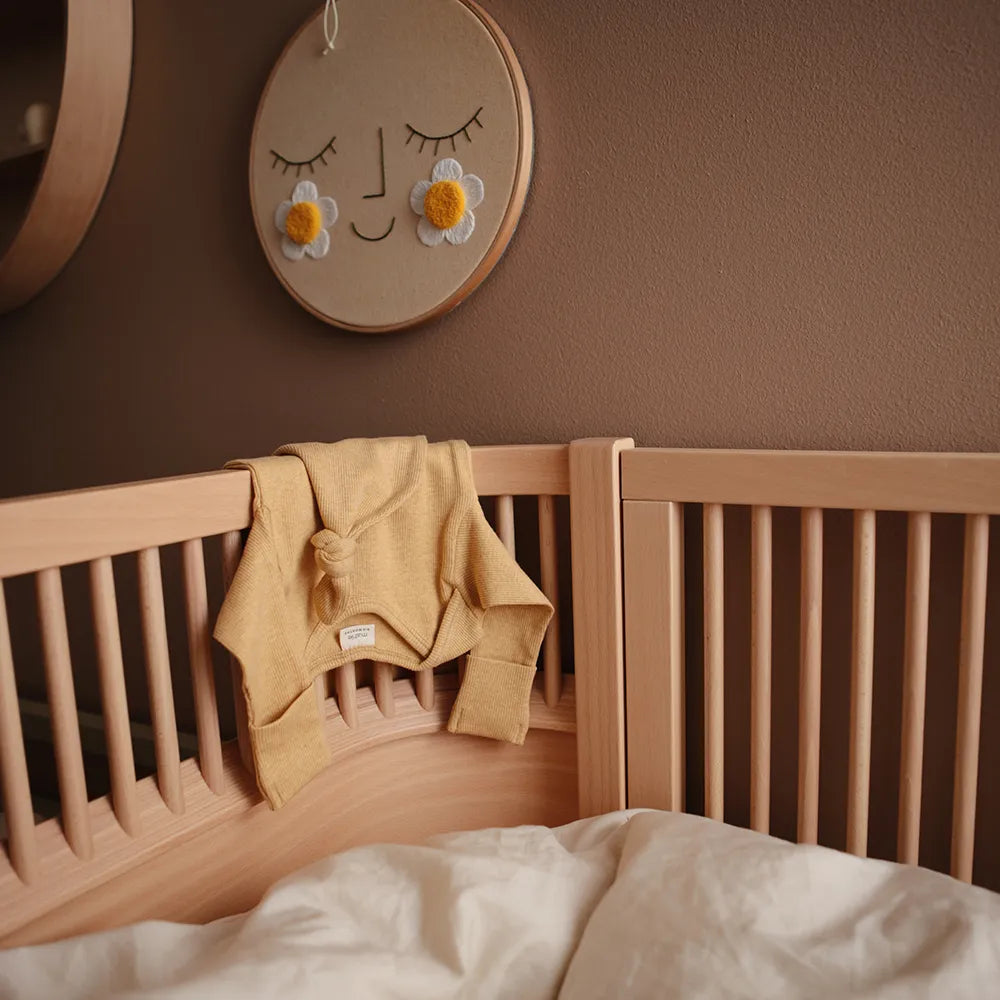 Mushie baby bodystocking