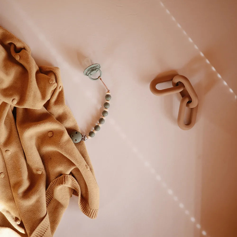 Mushie kæde bidering