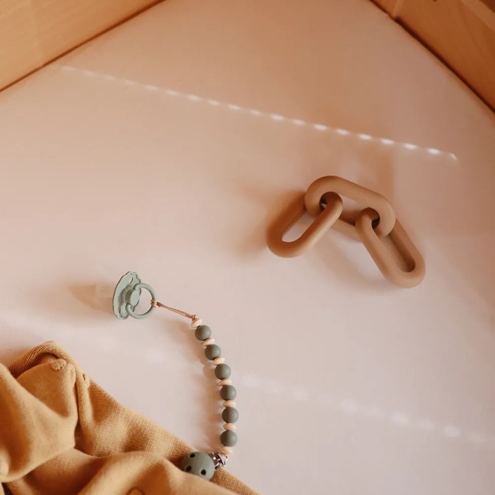 Mushie kæde bidering