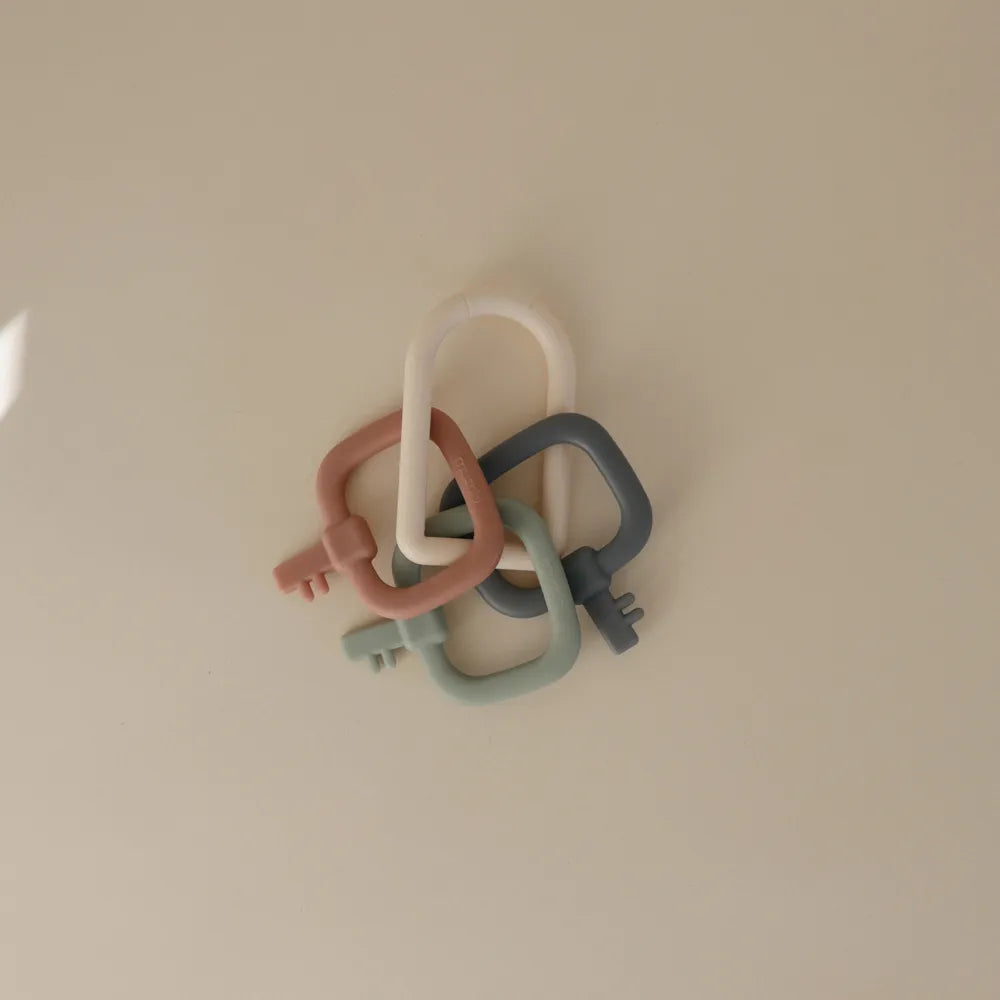 Mushie nøglelegetøj