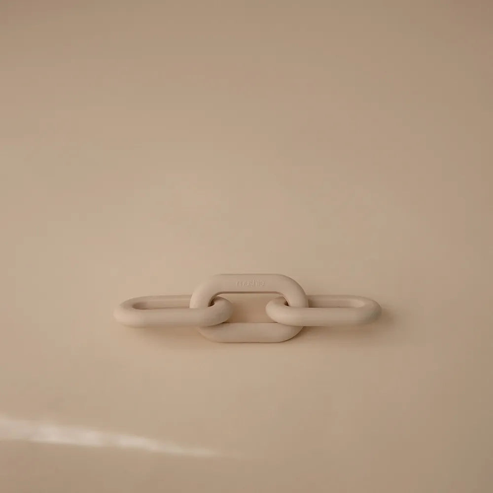 Mushie kæde bidering